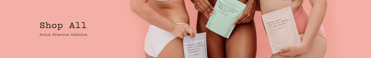 Shop All collection banner. Two women in underwear holding frank body sachets. Text reads: Shop All. Active. Attentive. Addictive.