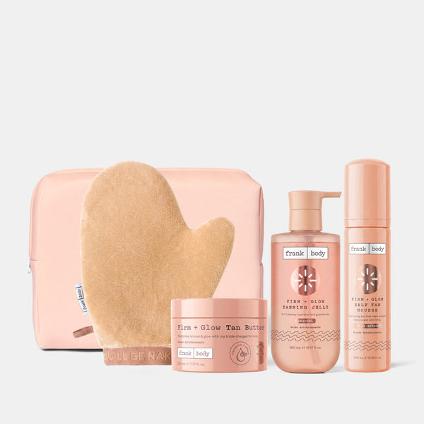 The frank body Bronze With Benefits Kit: a pink pouch, tanning mitt, Firm + Glow Tan Butter, Tanning Jelly and Self Tan Mousse.