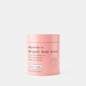 A pink cylindrical tub of Frank Body Express-o Whipped Body Scrub on a light gray background.