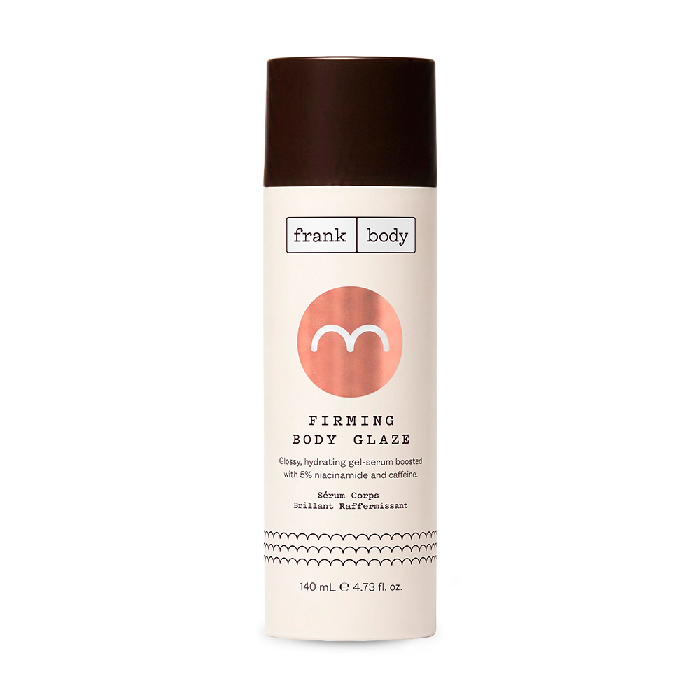 A cream bottle of frank body Firming Body Glaze, a hydrating gel-serum with niacinamide and caffeine, on a white background.