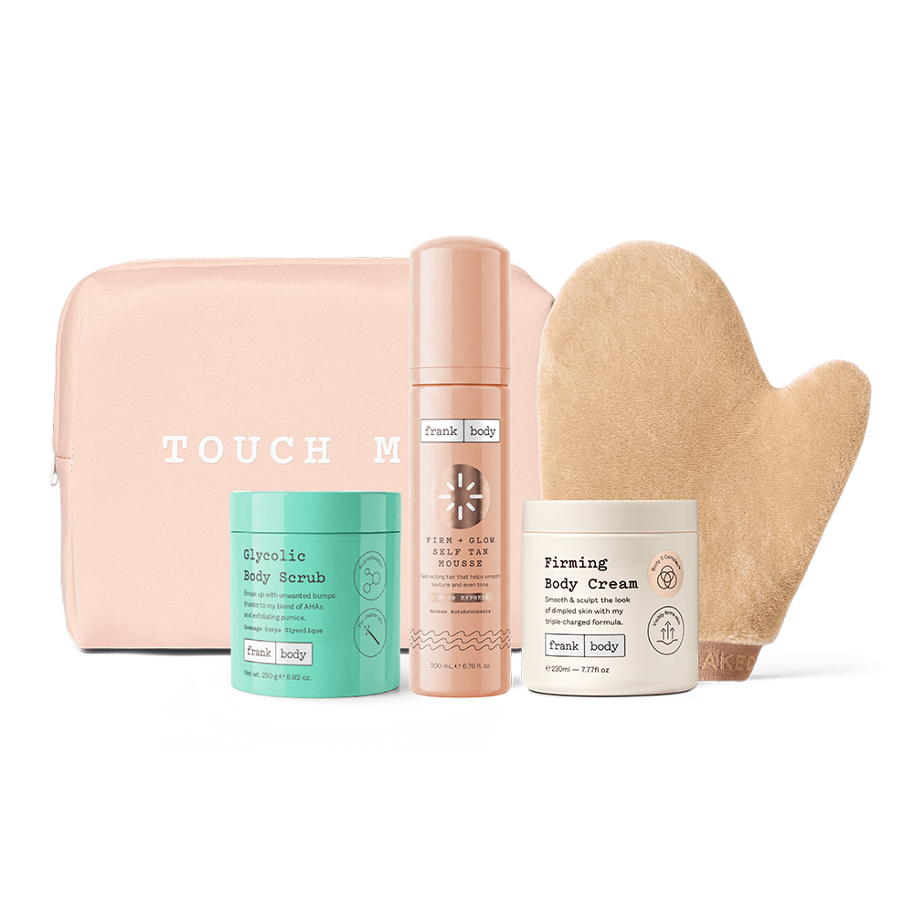 The Everything Shower Kit: a pink Touch Me Babe pouch with frank body Glycolic Body Scrub, Firm + Glow Self Tan Mousse, Firming Body Cream and a tanning mitt.