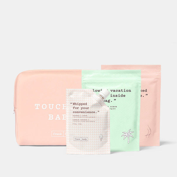 The Shower Scrubs Kit: a pink Touch Babe pouch with frank body coffee scrub sachets in pink, mint and cream.